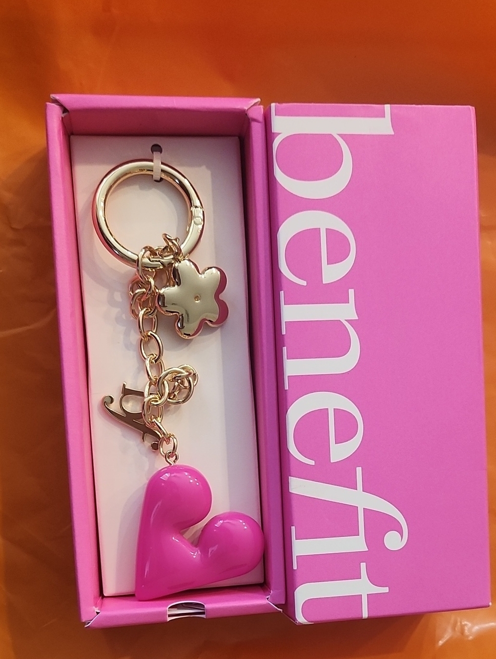 NEW IN BOX. Benefit Glossy Pink Heart Key Charm with Gold Accents